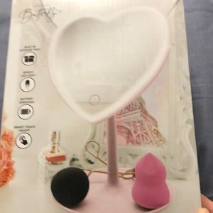 NIB pink heart lighted make up mirror. Battery operated, 3 AAA.